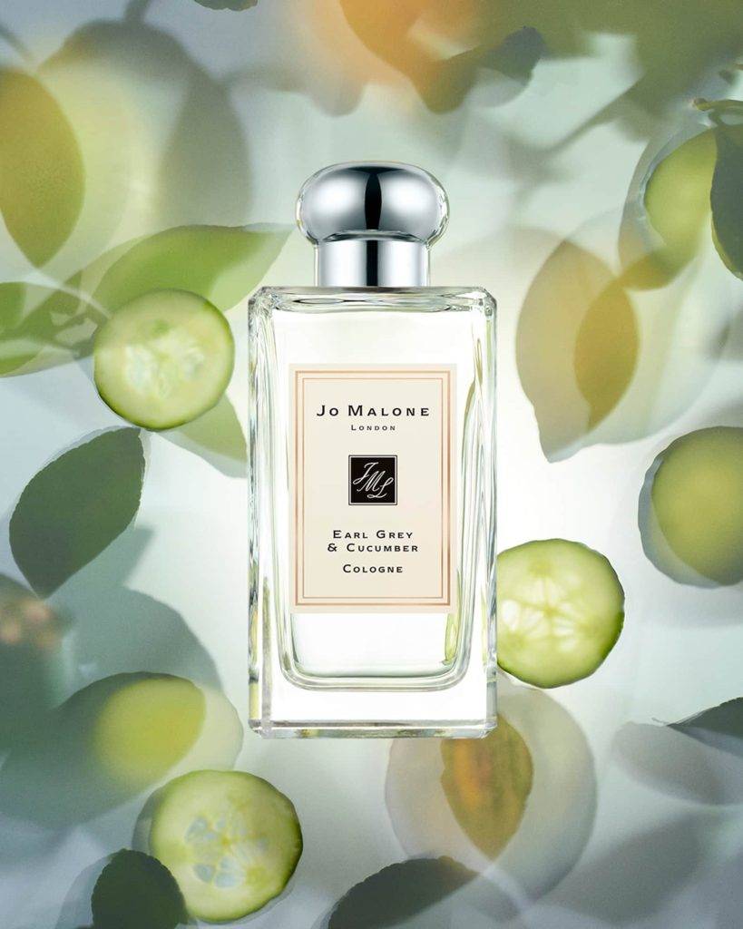 Jo Malone Earl Grey & Cucumber tea scented perfume bottle with sliced cucumber and black tea