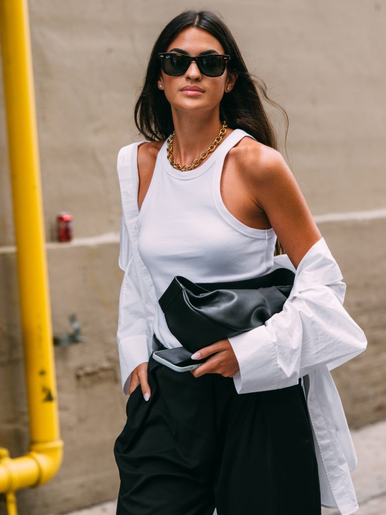 Fashion blogger styling one of the best tank tops for summer in a clean, minimalist outfit