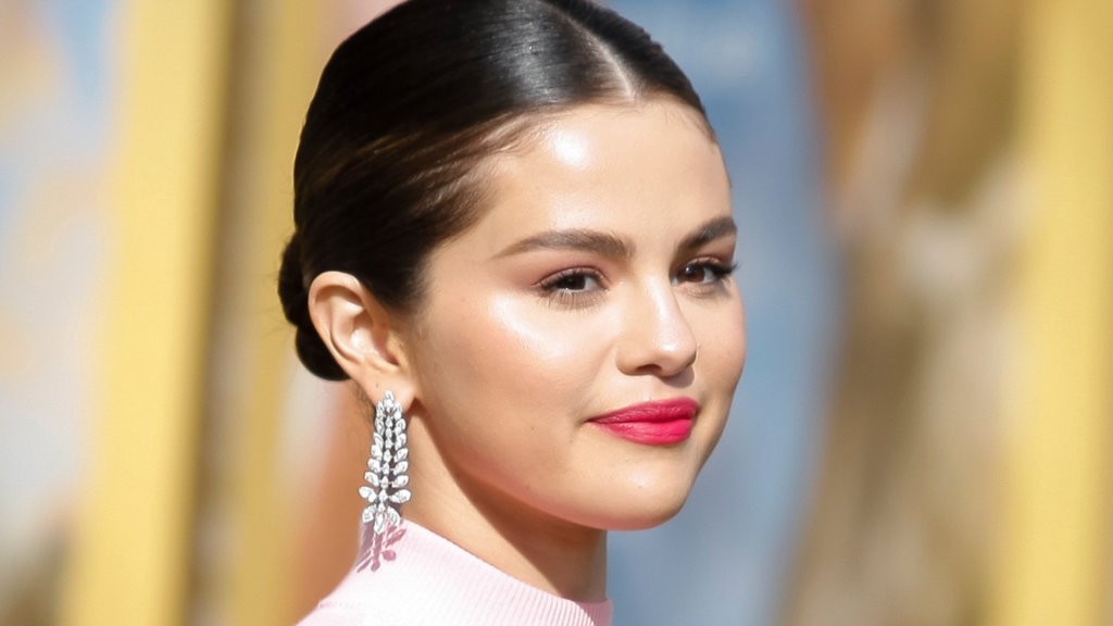 Selena Gomez wearing glowing, dewy makeup — summer beauty inspiration